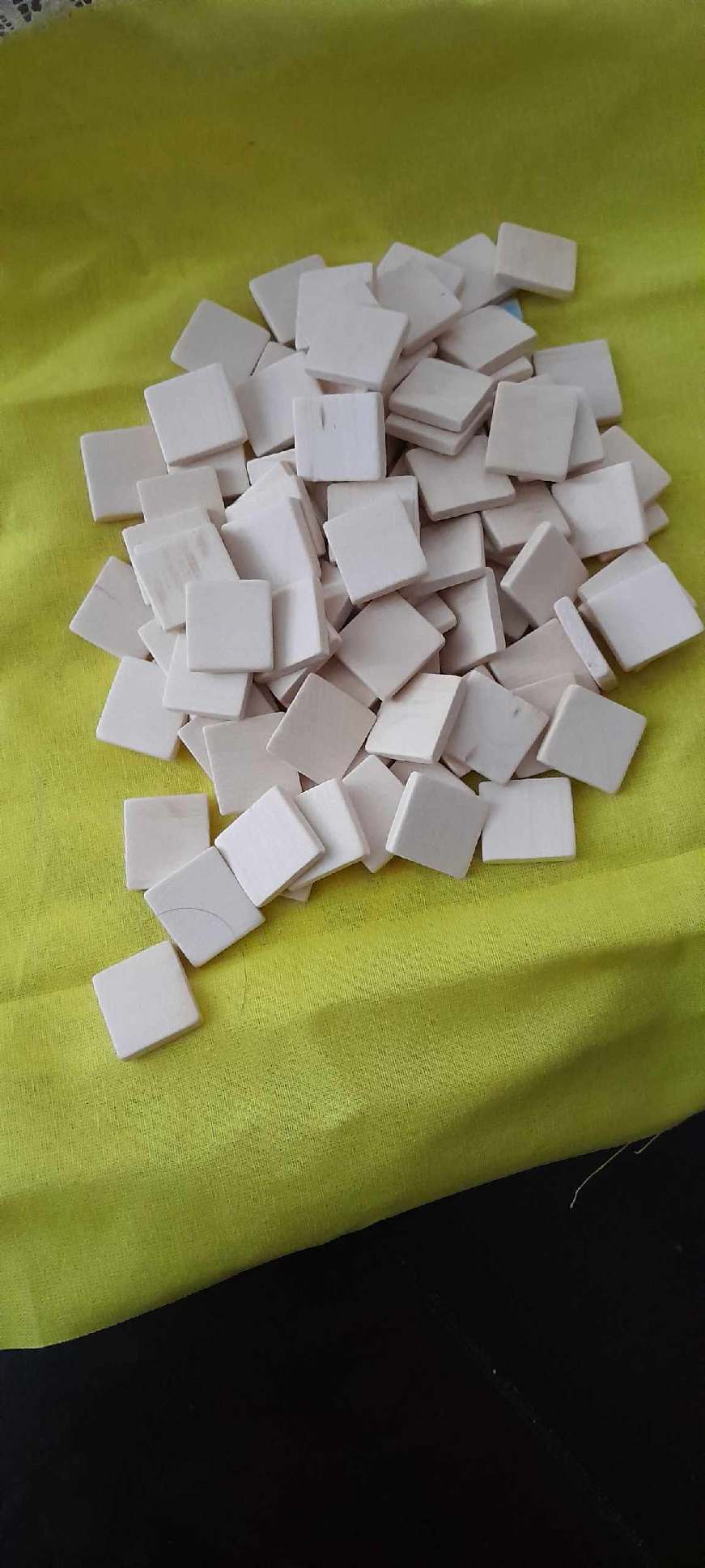 Blank scrabble pieces.