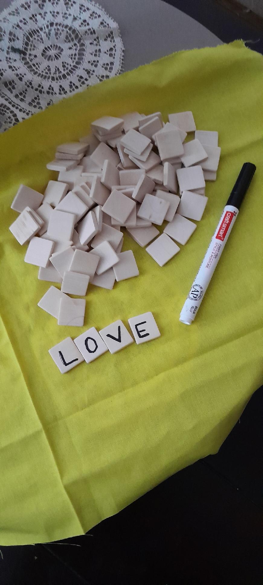 Blank scrabble pieces.